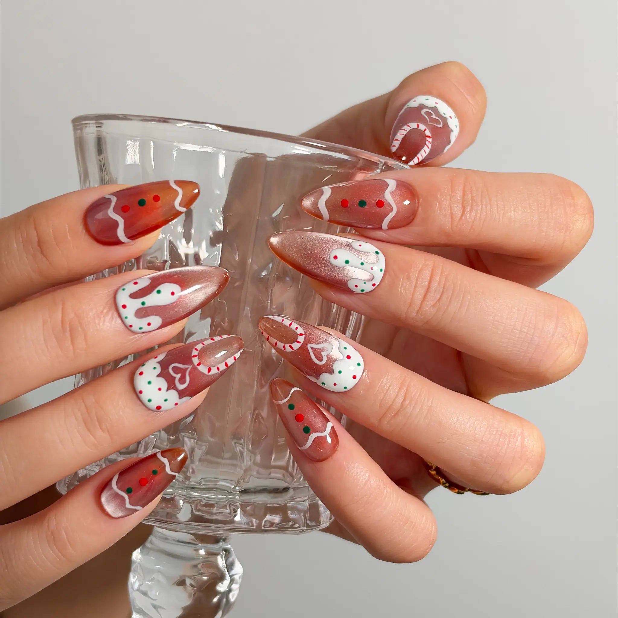 Gingerbread Frosting Dream Long Almond press-on nails, modeled detail view 2