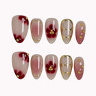 Rose Garden Gilded press-on nails in Pink, Red, Gold on a white background