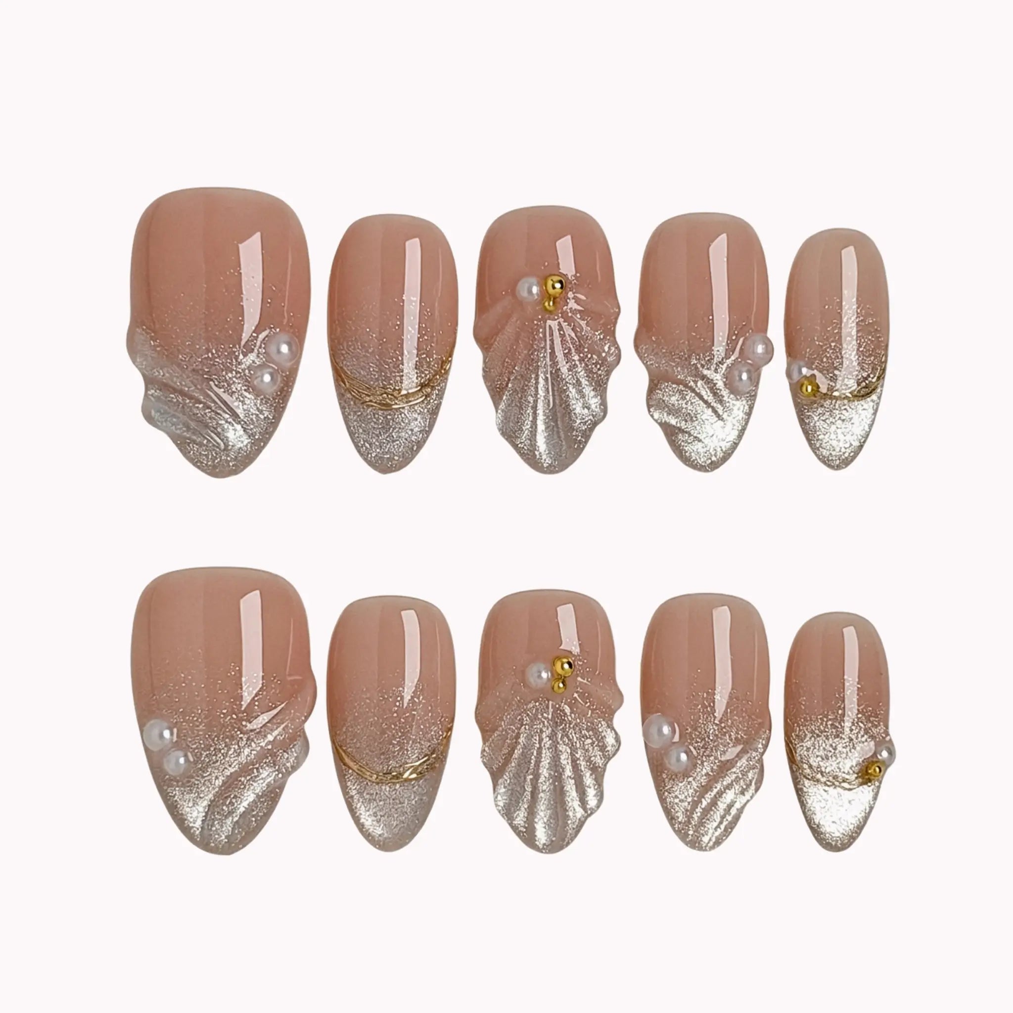 Pearl Shell Whisper press-on nails in Nude, White, Gold on a white background