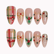 Yuletide Plaid Charm press-on nails in Red, Green, Nude on a white background