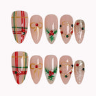 Yuletide Plaid Charm press-on nails in Red, Green, Nude on a white background