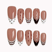 Cocoa Dot French press-on nails in Nude, Brown, White on a white background