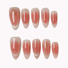 Roseglass Star Aura press-on nail set in Pink, Nude, White with pink and nude aura design with fine white starbursts on a white background