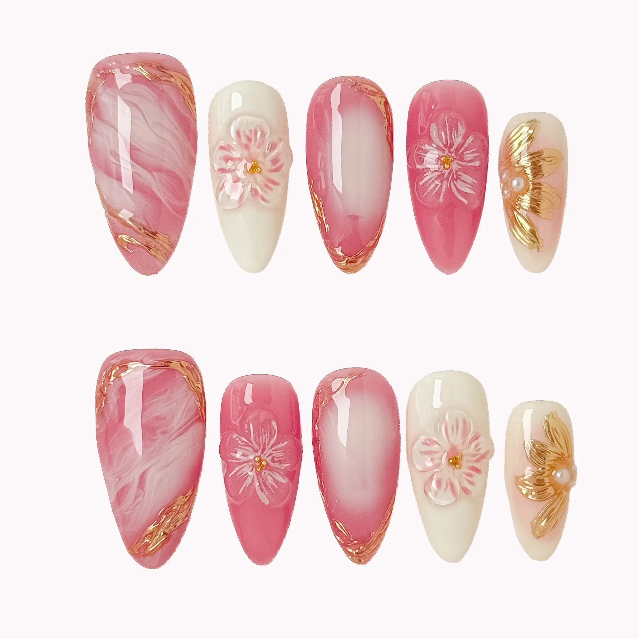 Blush Petal Veil press-on nail set in Pink, White, Gold with pink and white ombre design with sculpted flowers and gold accents on a white background