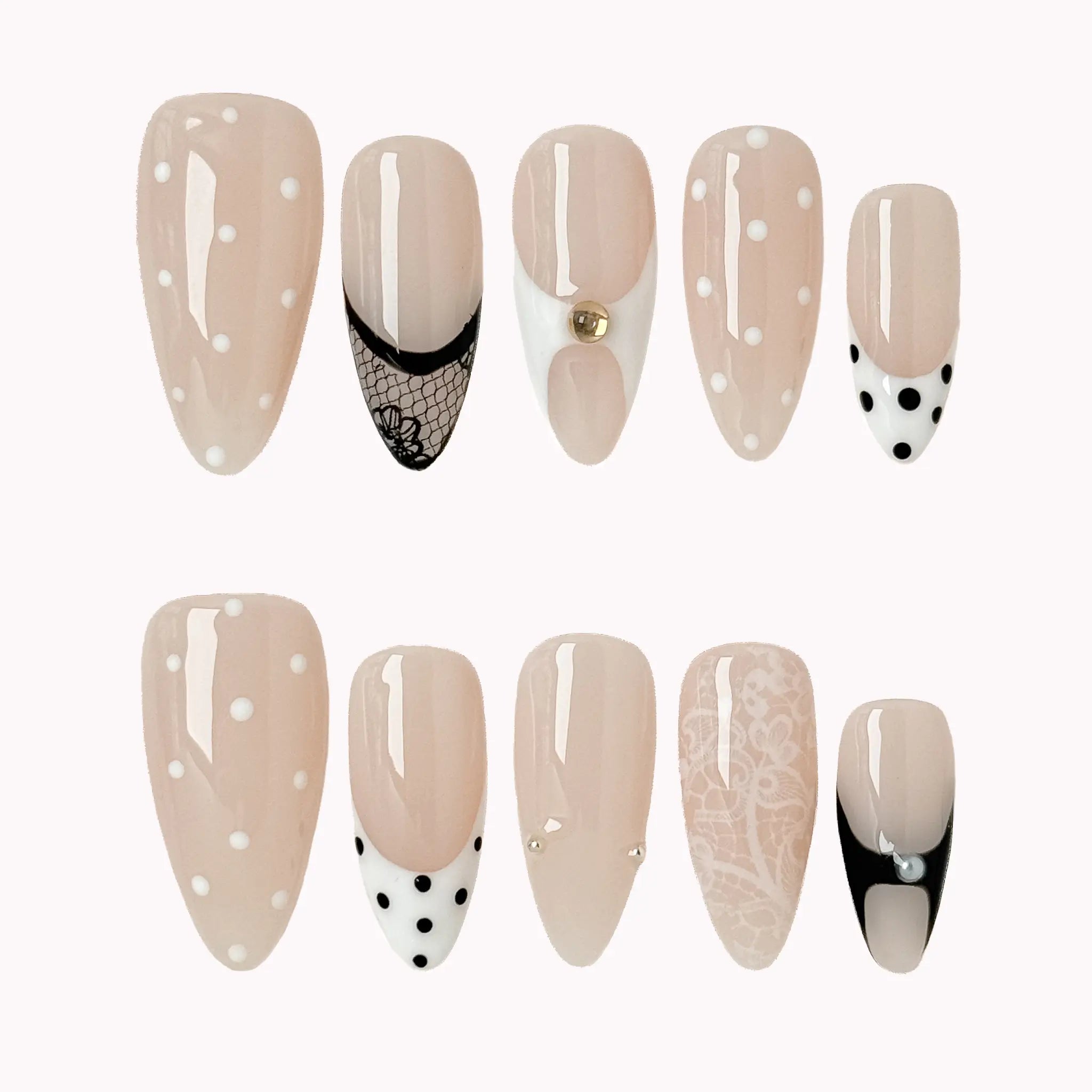 Noir Lace Whisper press-on nail set in Black, White, Nude, Silver with black, white and nude French tip design with lace and polka dots on a white background