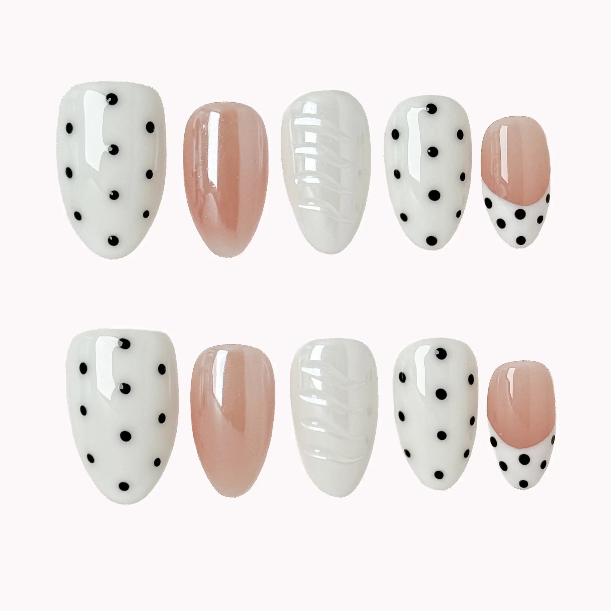 Porcelain Dot Muse press-on nail set in Black, White, Nude, Silver with white, nude and black design with polka dots and raised texture on a white background