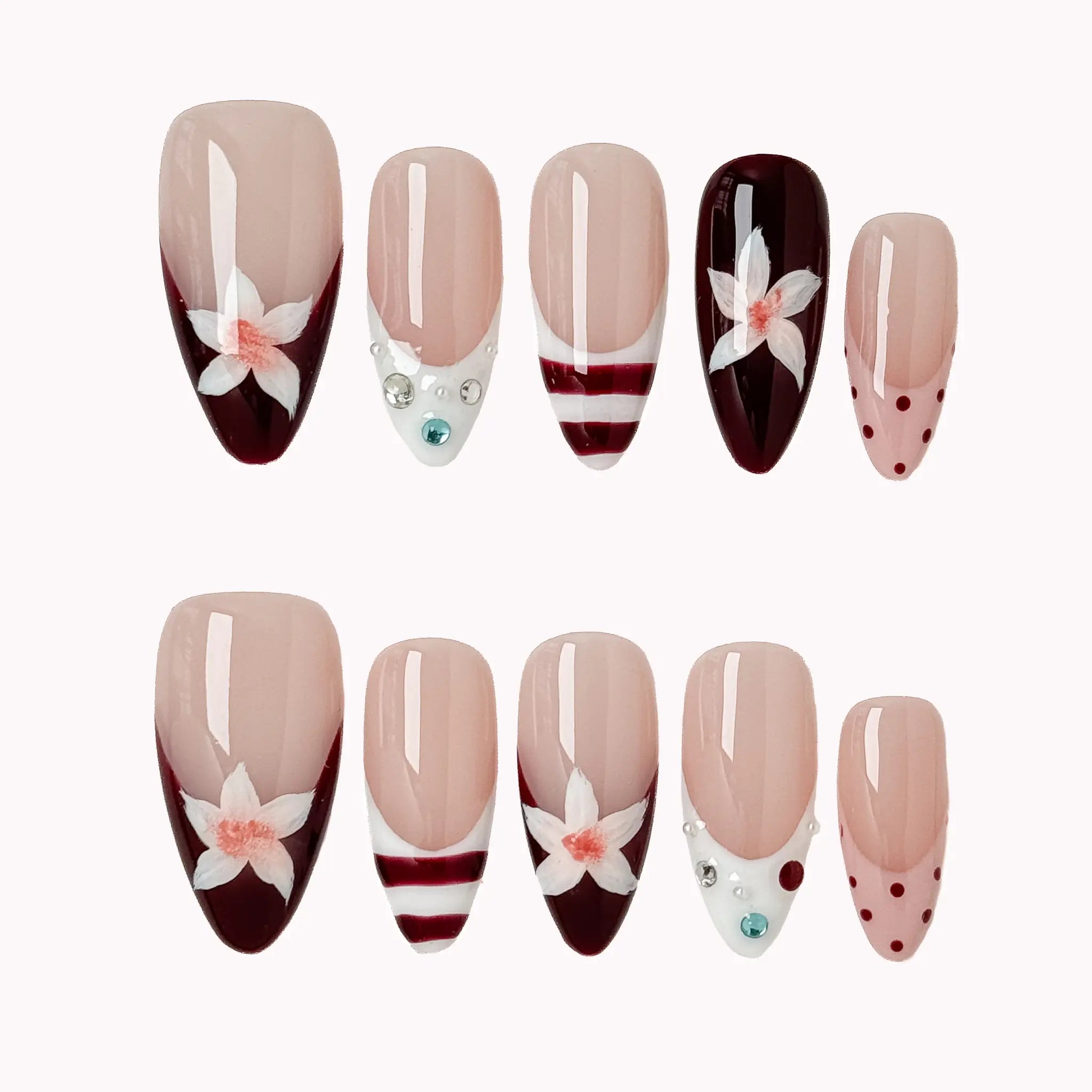 Burgundy Bow Sonata press-on nail set in Red, Nude, White, Pink with deep red French tip design with white bows, stripes and polka dots on a white background