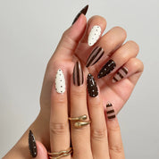 Cocoa Dot Rhythm medium almond press-on nails worn on hands, view 2