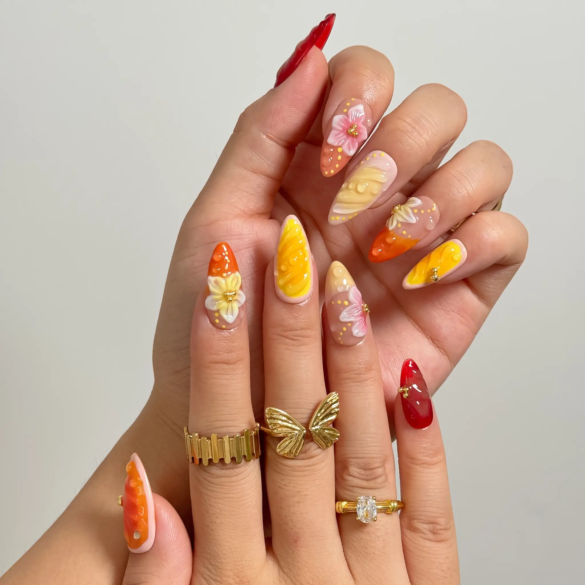 Harvest Citrus Bloom long almond press-on nails worn on hands, view 2