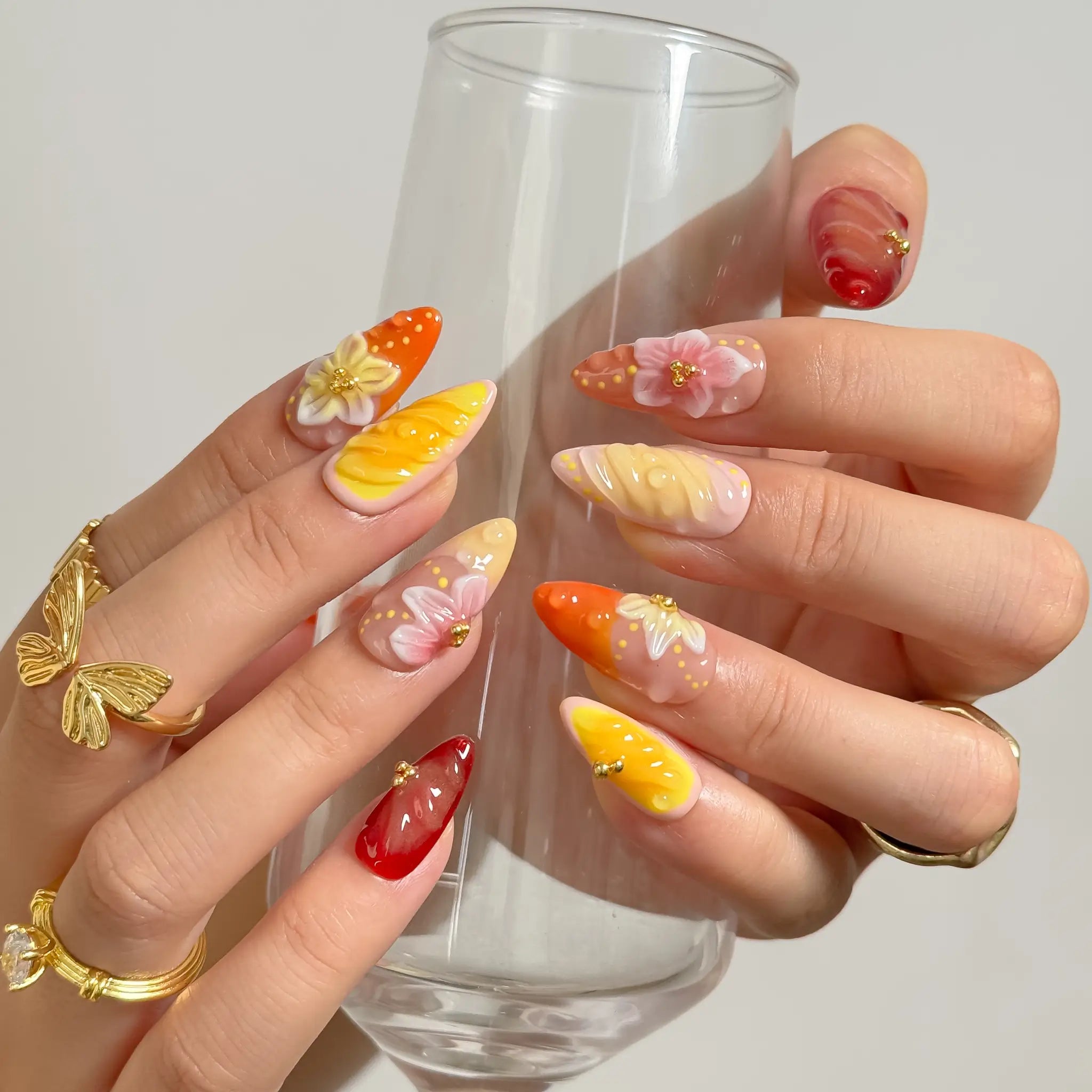 Harvest Citrus Bloom long almond press-on nails worn on hands, view 3