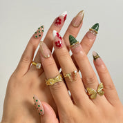 Emerald Garden Relic long almond press-on nails worn on hands, view 1