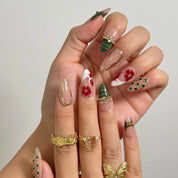 Emerald Garden Relic long almond press-on nails worn on hands, view 2