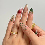 Emerald Garden Relic long almond press-on nails worn on hands, view 3