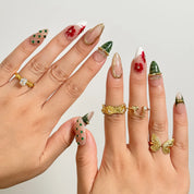 Emerald Garden Relic long almond press-on nails worn on hands, view 4